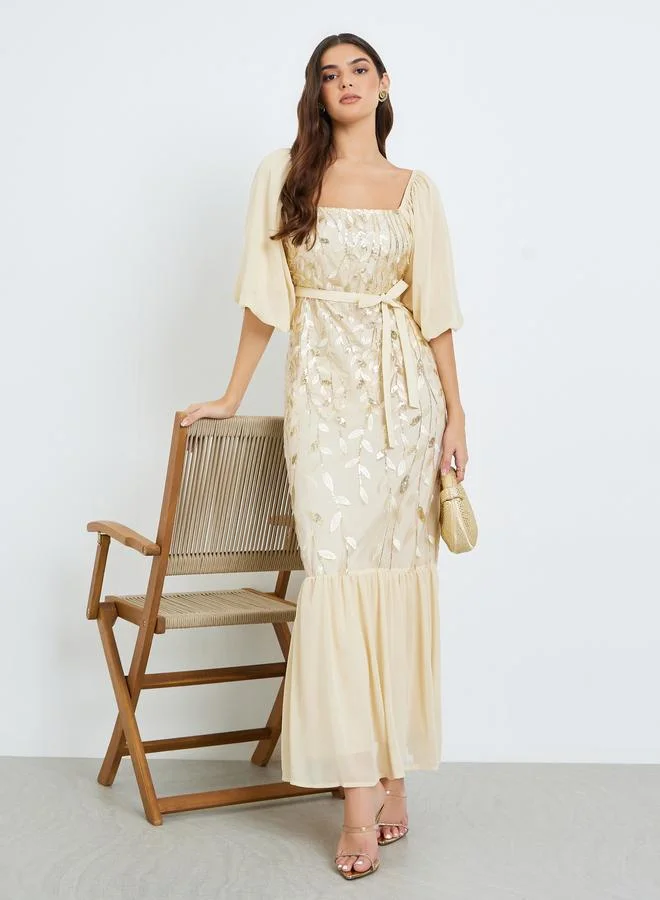 Styli  Women Beige Embroidered Ruffled Hem Maxi Dress for Women | Best Price UAE